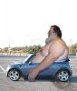 big%20guy%20in%20small%20car.jpg