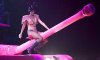 Rihanna-straddles-the-barrel-of-a-tank-in-concert[1].jpg