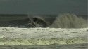 shredding bayhead
surfer firing out of a barrel