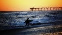 Surifng during Sunset. United States, Surfing photo