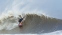 Post Hurricane Irene
A surfer starts to trim.