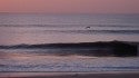 The Early Pelican Gets the Wave