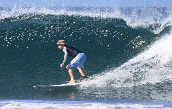 Surfing at Playa Guiones, Nosara, CR