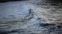 Wave coming in during sunrise in Acadia