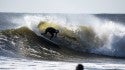 Unknown goofy footer shredding a left, in NY