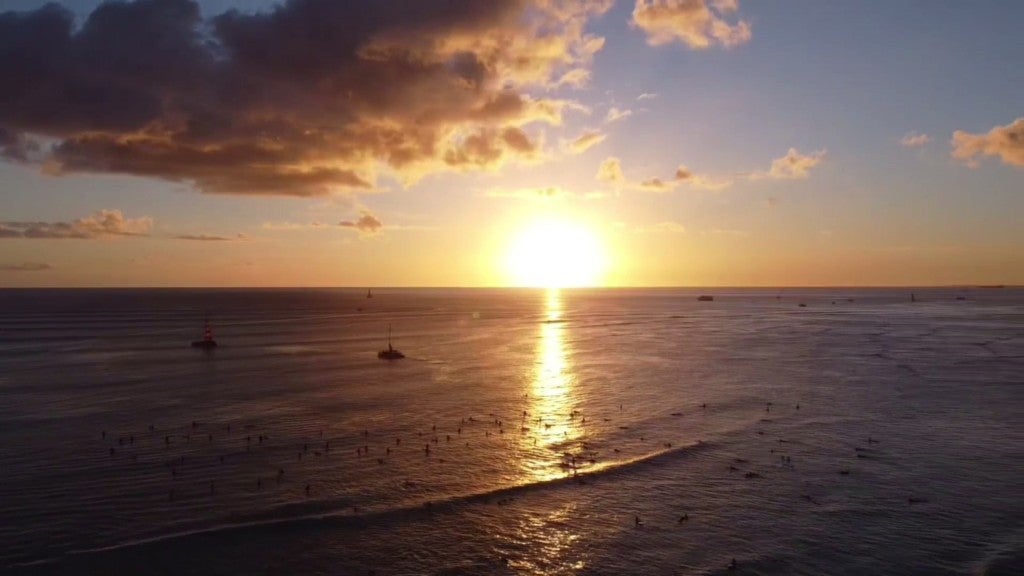 Surfers at Sunset Waikiki. Oahu, Scenic photo