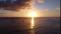 Surfers at Sunset Waikiki. Oahu, Scenic photo
