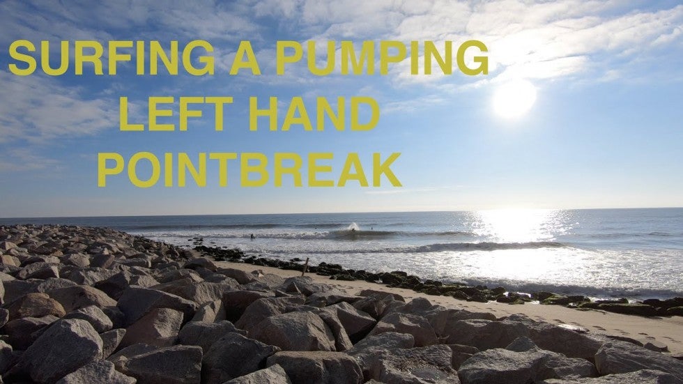 SURFING A PUMPING LEFT HAND POINTBREAK